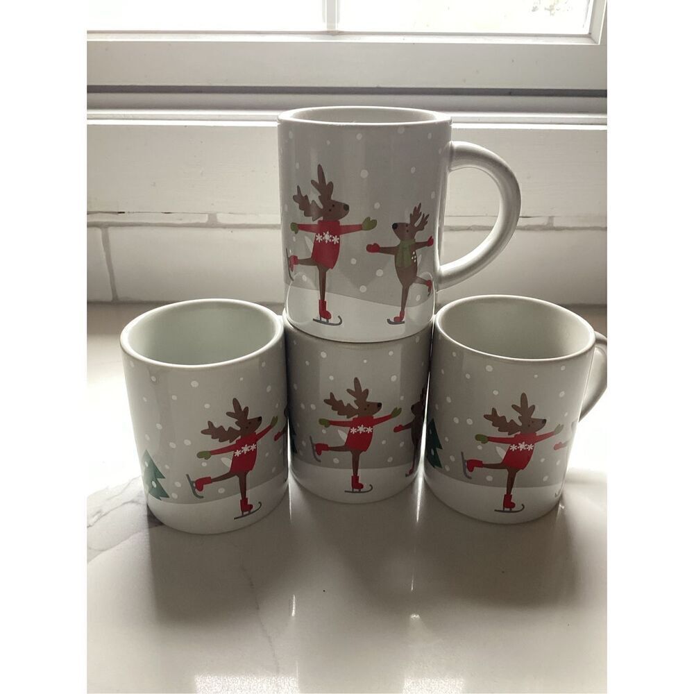 Set of 4 Crate & Barrel 12oz Ceramic Coffee Mugs Joan Anderson Skating Reindeer